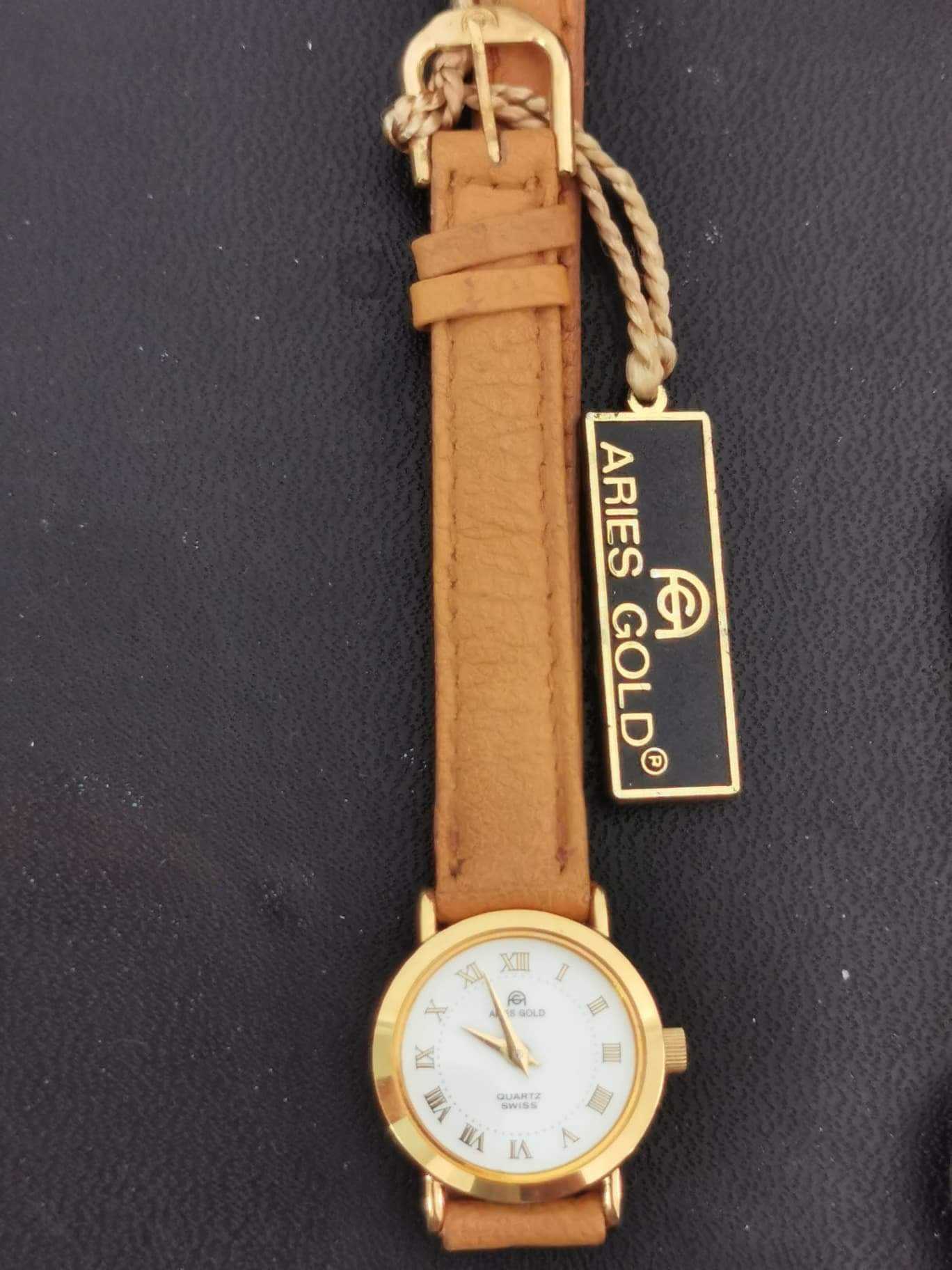 Aries 2025 gold swiss